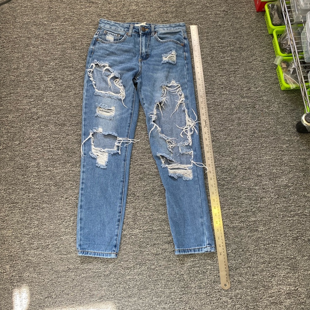 Distressed Blue Jeans